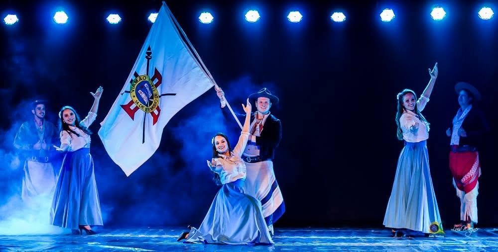 Arte Nativa Folk Dance Group performing traditional Gaucho dance on stage